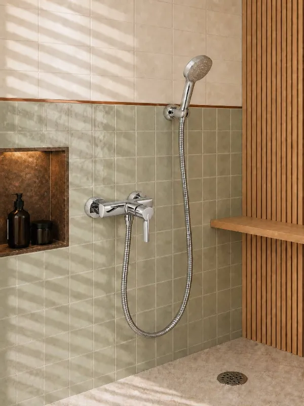 Geometric chrome wall mounted shower mixer with triangular prism design